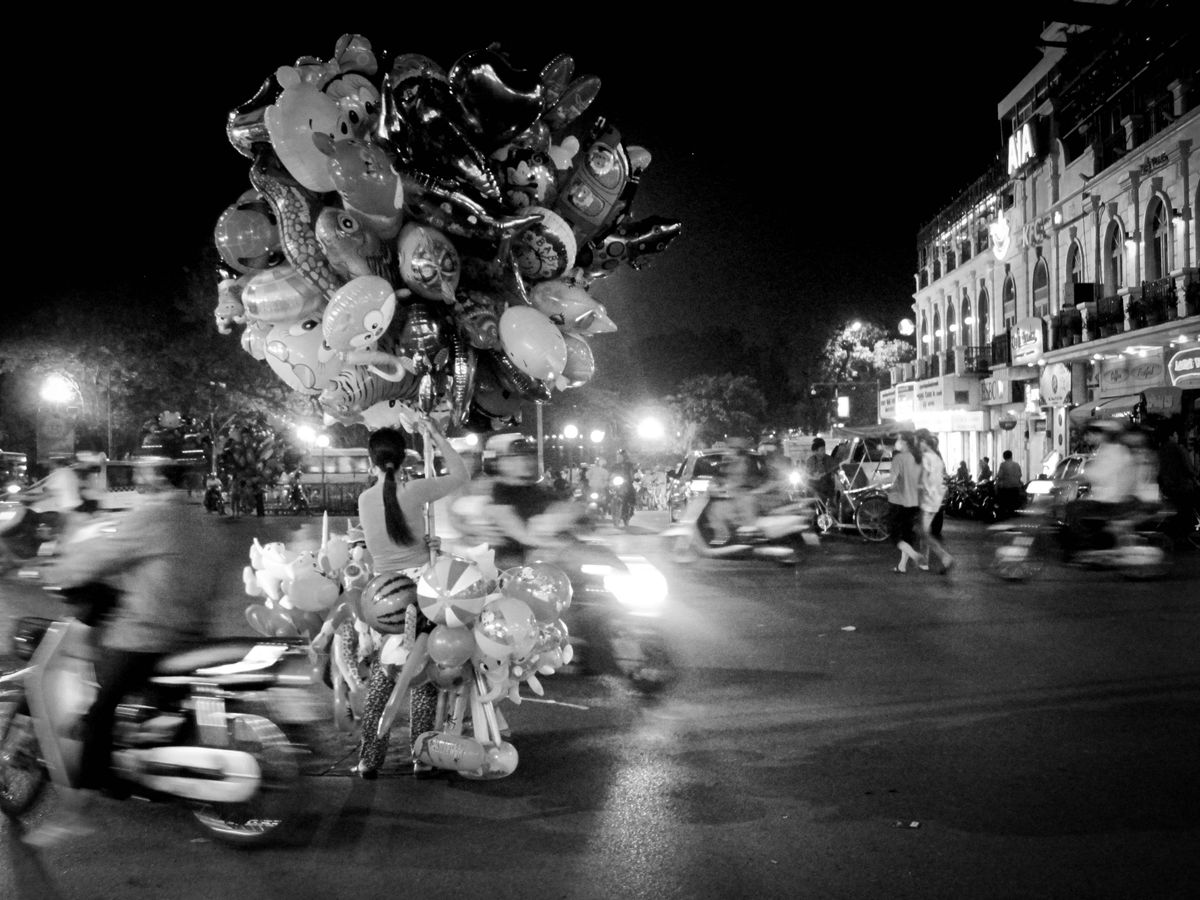 Selling balloons in Hanoi, Vietnam