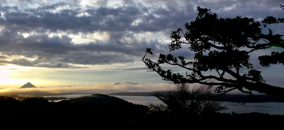 lake and distant view of volcano