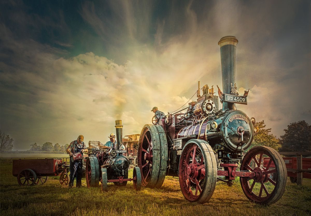 Traction engine accompanied by miniature version.