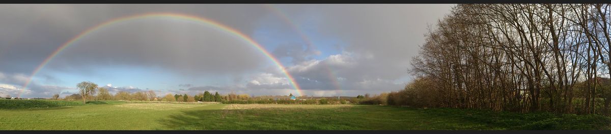 Lucky to catch a double rainbow on my dog walk. Xperia S panoramic mode.